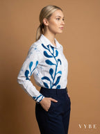Woman wearing White and Blue Botanical Shirt by VYBE Studio