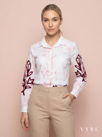 Woman wearing White and Burgundy Floral Batik Shirt by VYBE Studio